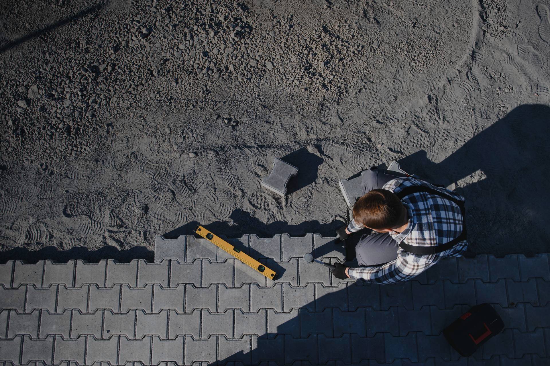 2close-up-of-construction-worker-installing-and-lay-2026-01-11-10-14-35-utc_2